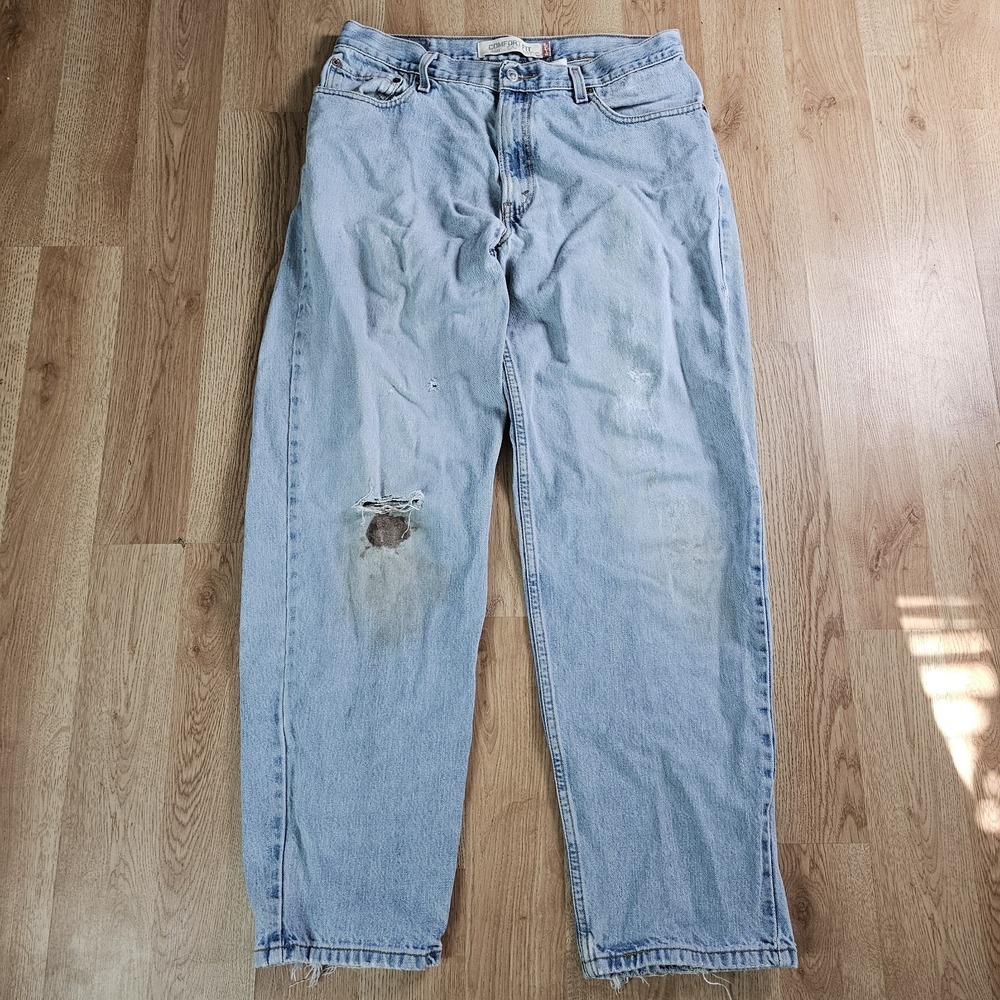 Levi's 560 Comfort Fit Jeans Mens 36x34 Light Wash Distressed Blue Denim Tapered